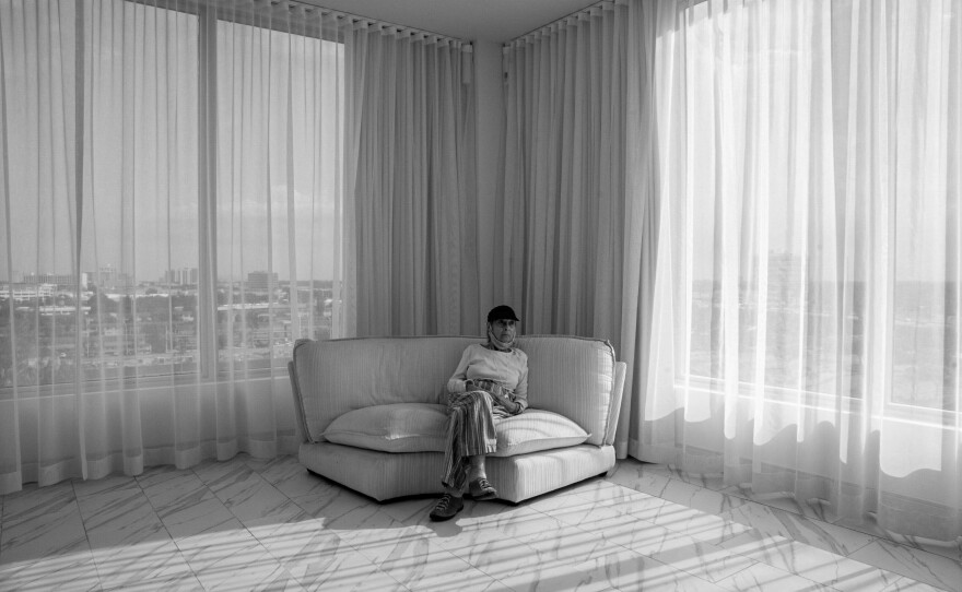 Audrey waits for the movers to bring in her furniture to her new apartment in an assisted living facility, Aventura, Miami, Fla., May, 2020.