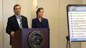 California Attorney General Xavier Becerra and Tania Ibanez, special assistant attorney general, in San Diego, Nov. 13, 2018. 
