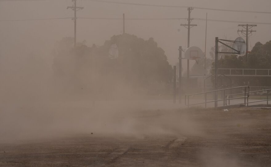 A dust storm envelopes playground in Holtville, Calif. on Aug. 6, 2024.