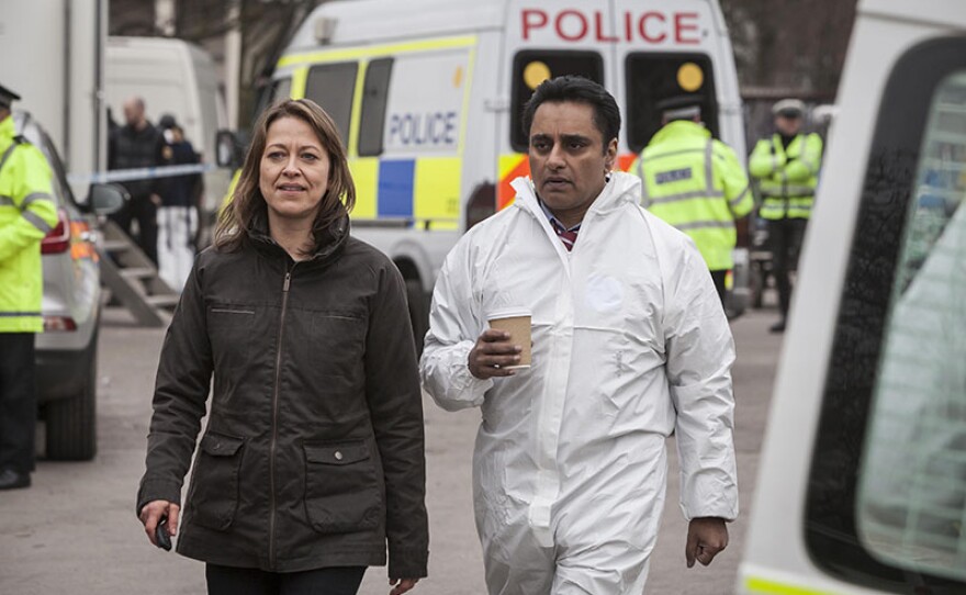 Nicola Walker as DCI Cassie Stuart and Sanjeev Bhaskar as DS Sunny Khan in a scene from UNFORGOTTEN Season 1, Episode 1. 