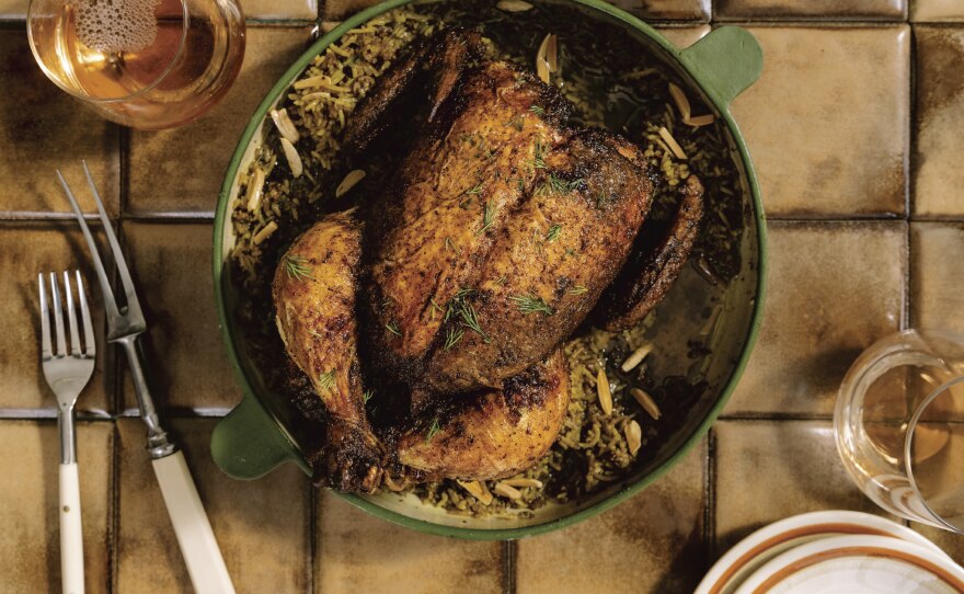 Many Eid meals include a main dish for the table like this Djaj Mahshi or chicken stuffed with spiced rice.