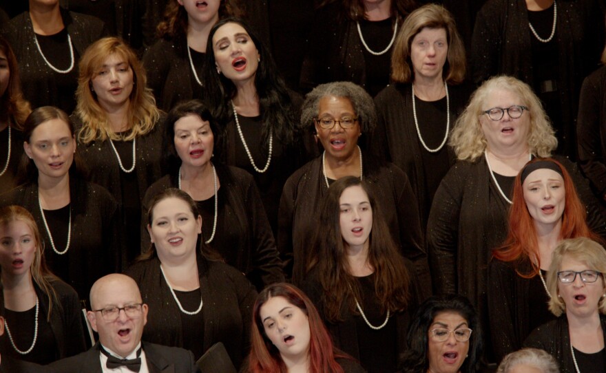 Pictured: Members of the Bach Festival Choir sing.