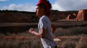 Thomas Martinez runs down Asaayi Road.