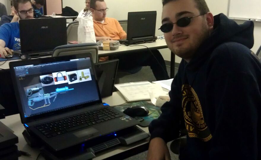 NonPariel student and part-time lab assistant Robert Grimes, 22, finishes up a 3-D model for the game he's creating.