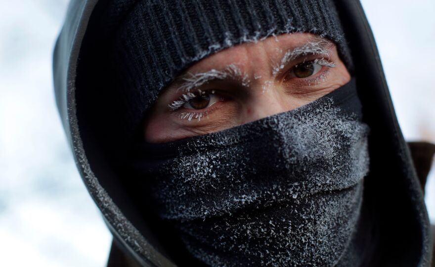 Frank Lettiere's eyebrows and eye lashes froze after his walk along Lake Michigan's Chicago shoreline Wednesday. Frostbite warnings were issued for parts of the U.S. Midwest, as outside temperatures plunged.