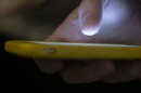 In this Aug. 11, 2019, file photo, a man is using a cell phone.