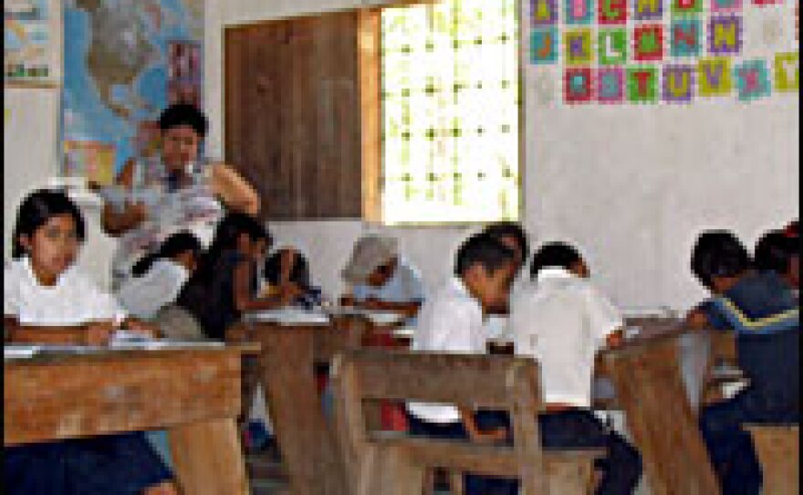 This school in Copan, Honduras, is one of more than 1,000 community-based schools built in the country under Wolfensohn's policies, which focused on fighting poverty in part through human development. Students here learn Spanish and their native language.