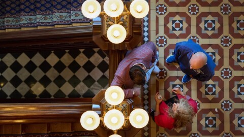 People chat together at the state Capitol in Sacramento on Sept. 12, 2025.