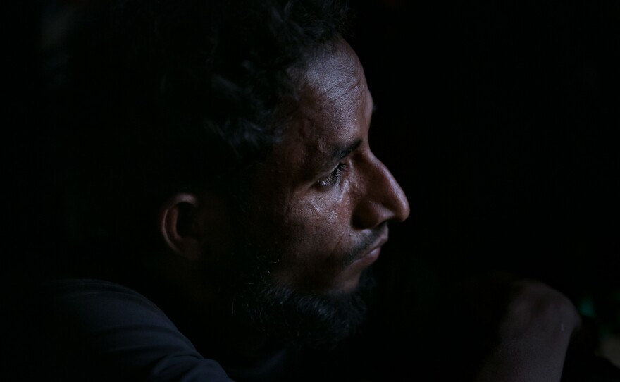 Mohamed Yonus in his home in the Hakimpara camp.