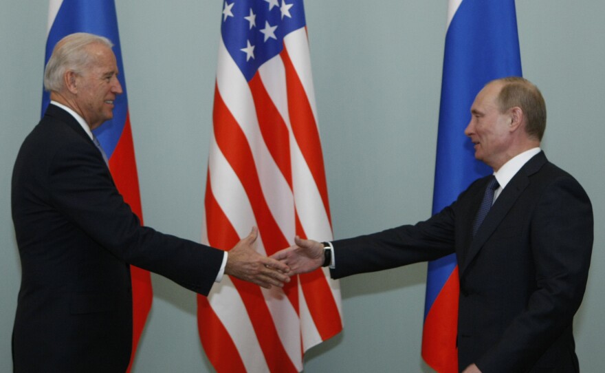 Vice President Joe Biden shakes hands with Vladimir Putin, then Russia's prime minister, in Moscow in 2011.