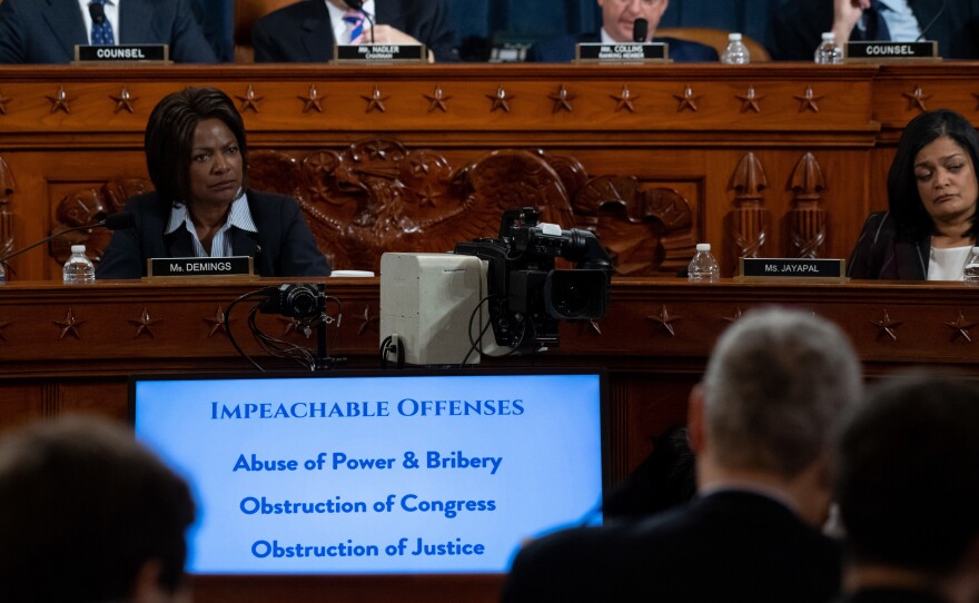 Impeachable offenses were listed on a monitor as the House Judiciary Committee listened to testimony by constitutional scholars earlier this week.