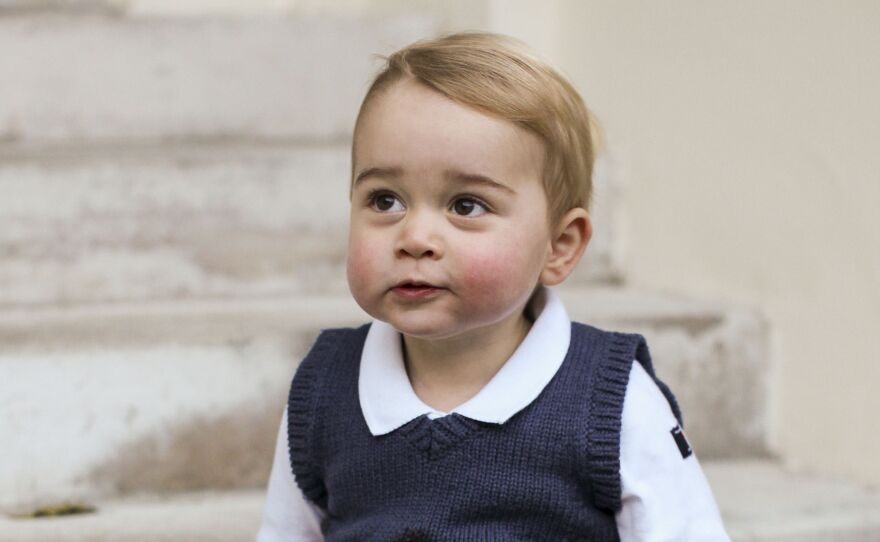 Prince George in one of three Christmas photos released by the British royal family.