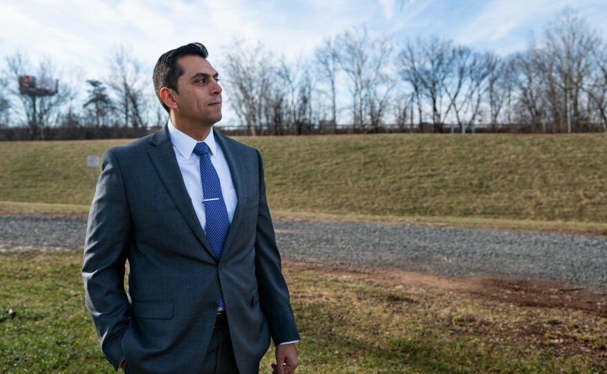 Town Councilman Abel Gomez stands near a levee in Bound Brook. "Without flood control," he said, "you were always the next natural disaster before you were wiped out."