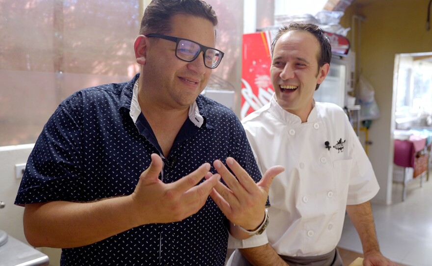 Chef Ivan Almici (right) sings with Jorge Meraz at Tre Galline Restaurant in Valle de Guadalupe.