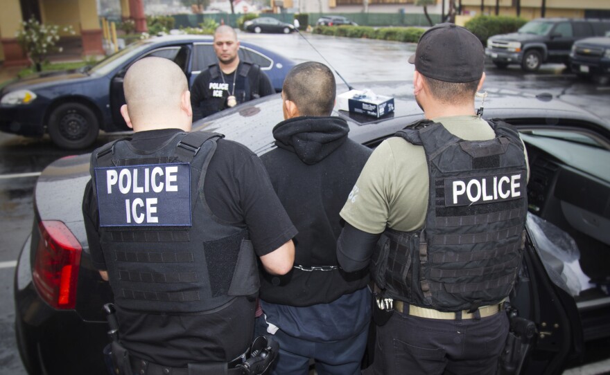 U.S. Immigration and Customs Enforcement make an arrest in Los Angeles, Feb. 7, 2017.