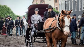 Nurse Mary Phinney (Mary Elizabeth Winstead) rides in a horse carriage. Based on real events, MERCY STREET takes viewers beyond the battlefield and into the lives of Americans on the Civil War home front as they face the unprecedented challenges of one of the most turbulent times in our nation’s history.