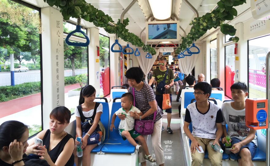 A book-themed streetcar in Guangzhou. During the trial period, passengers can ride the streetcars all day for a ticket costing the equivalent of $0.31