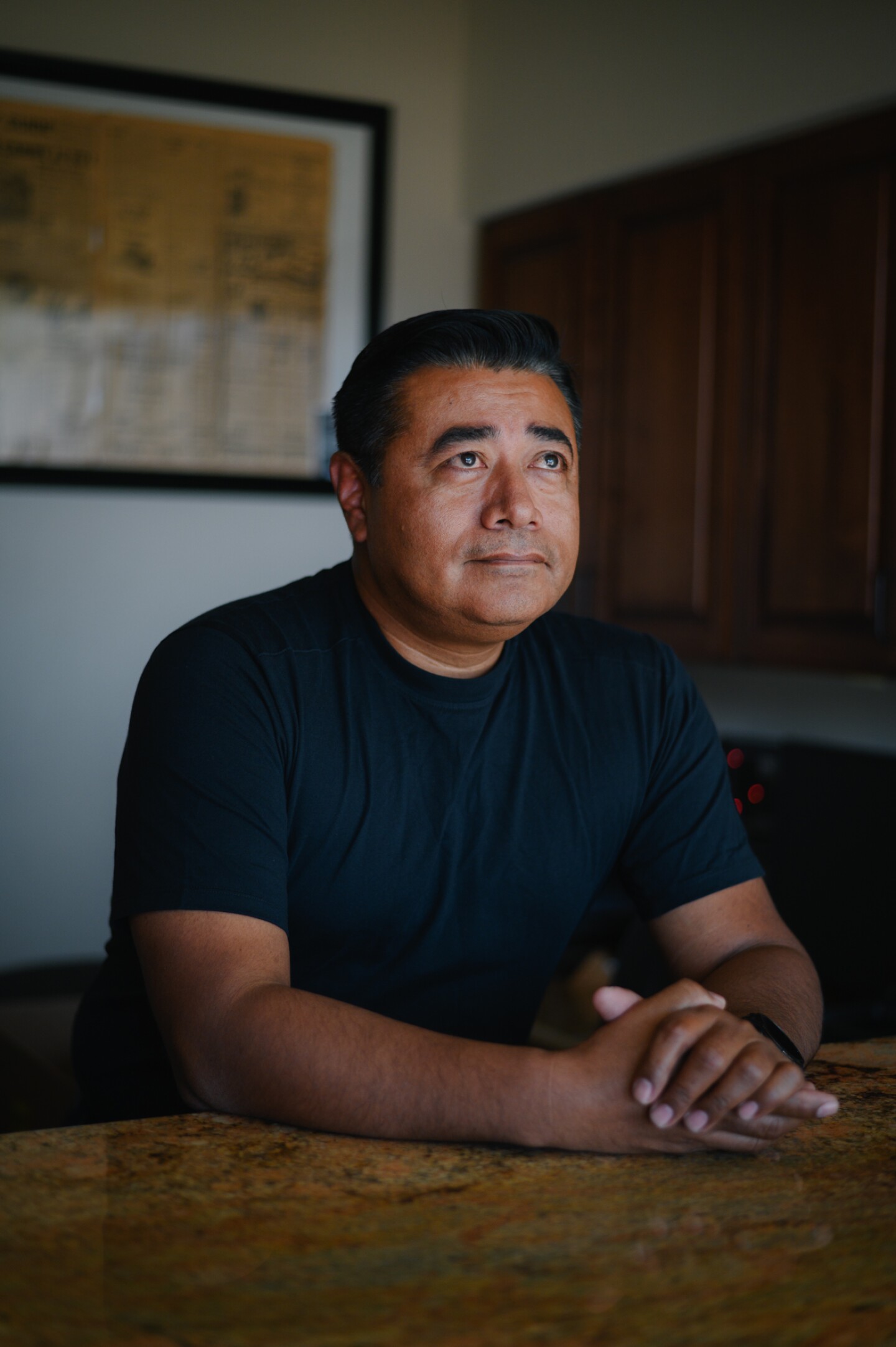 Juan Rodelo, a firefighter and amateur photographer, stands for a portrait at his fire station in Brawley, Calif. in Imperial County on Oct. 18, 2024.