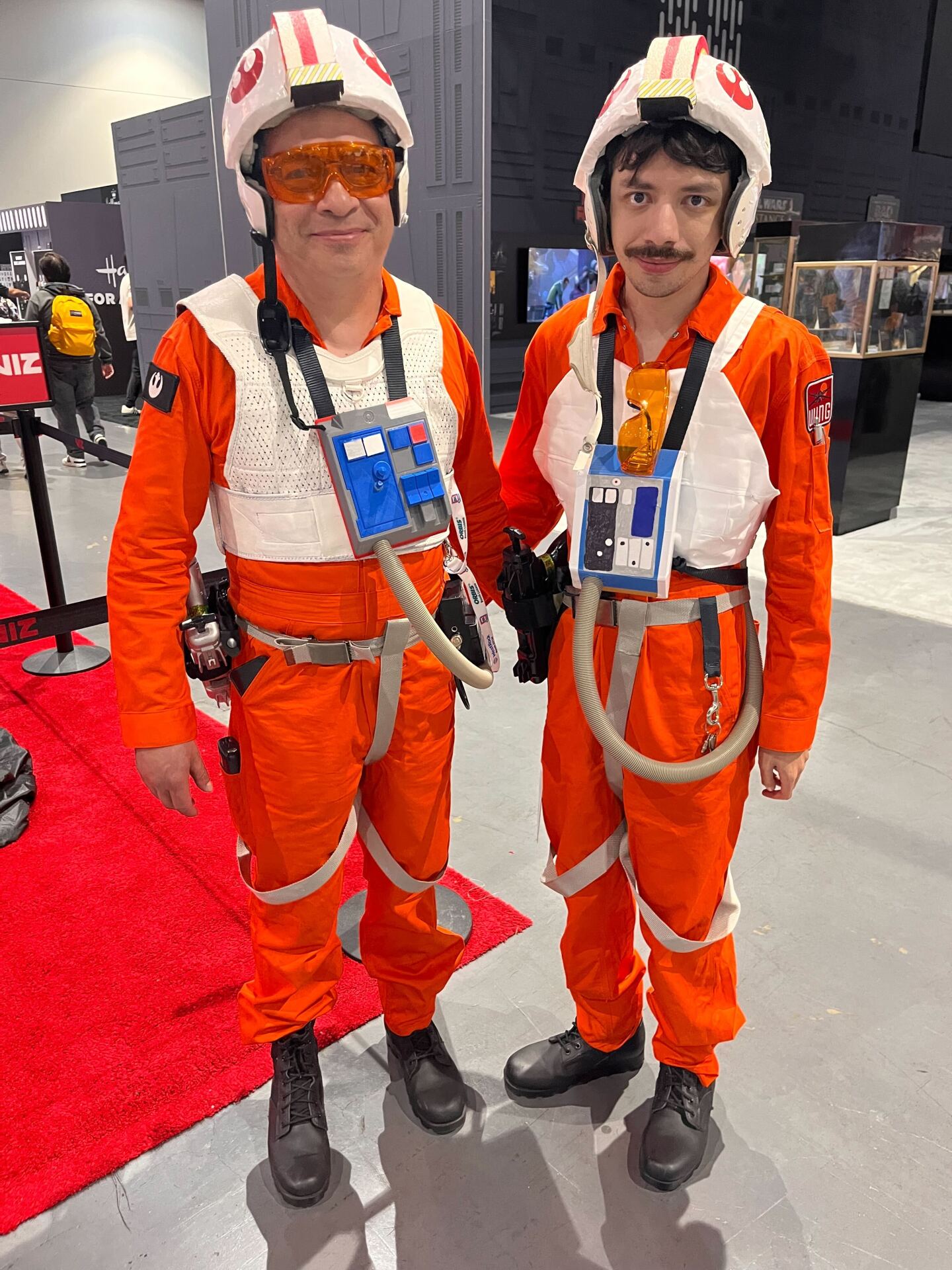 Father and son Gaston and Dylan Briones dress as X-wing pilots from “Star Wars” at Comic-Con on July 25, 2025.