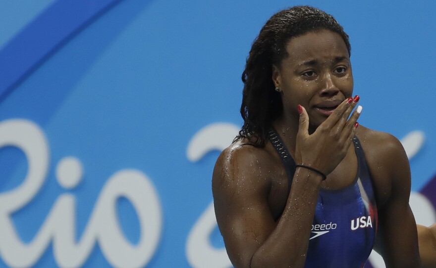 Simone Manuel won the gold medal in the women's 100-meter freestyle Thursday, becoming the first African-American to win an individual gold in swimming.