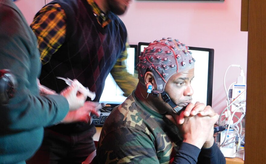 Subject undergoes EEG as part of word fluency task to determine neuro-psychological effects of cocaine addiction on brain function.