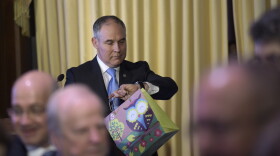 Environmental Protection Agency (EPA) Administrator Scott Pruitt looks at his watch after speaking to employees of the EPA in Washington, Tuesday, Feb. 21, 2017.