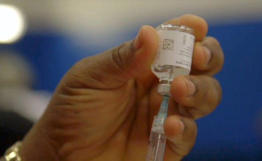 A flu vaccine vial is shown in this undated photo.