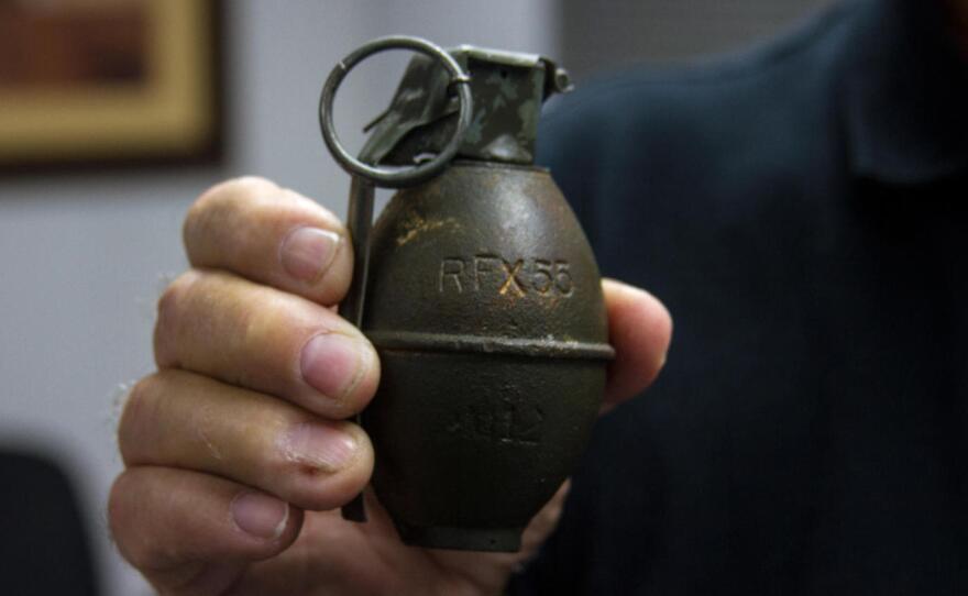 People try to recycle some pretty strange things — like this dummy hand grenade. Gilliam has it saved in a drawer, along with a 20 mm shell — the kind that would be fired from an Apache helicopter.
