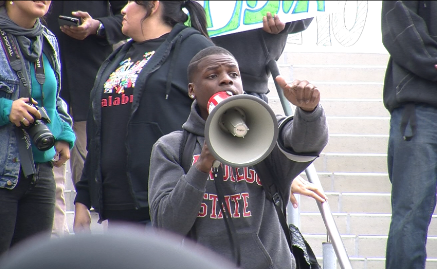 City College student Lawrence Samuel Walker addresses a crowd of about 200 during a walkout on Dec. 2, 2014.