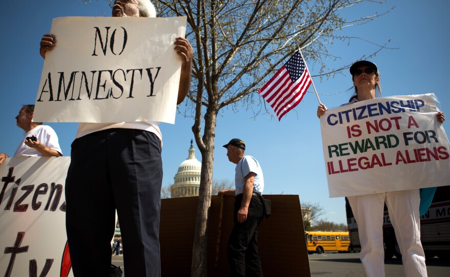 Protesters demonstrate in front of the U.S. Capitol on April 10.