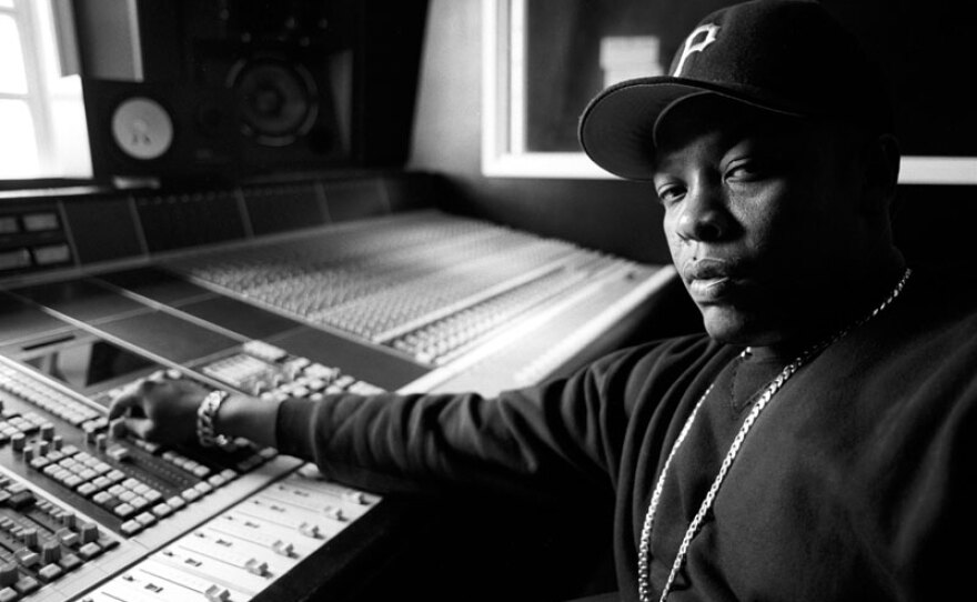 Dr Dre at sound board in recording studio mixing portrait NWA.