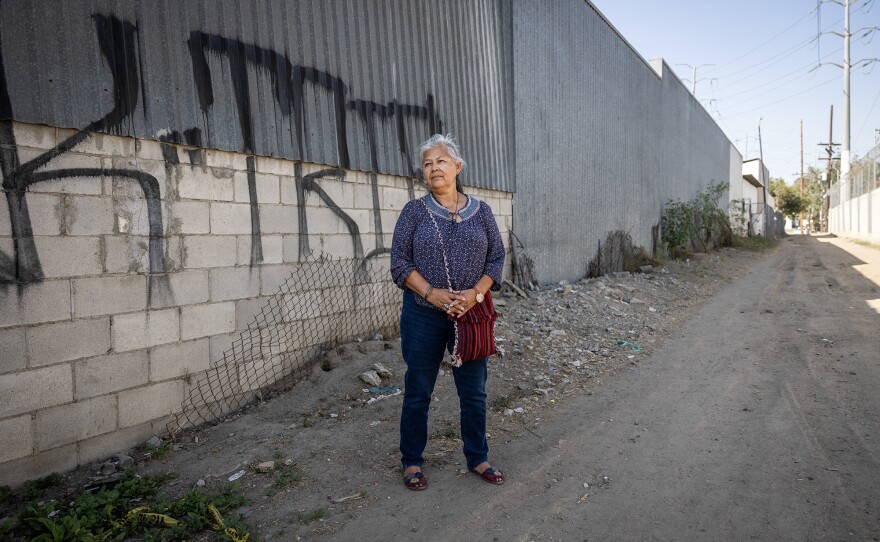 Magdalena Cerda Baez, Border Environmental Justice Policy Advocate at Environmental Health Coalition, stands near the former site of Metales y Derivados, a formerly U.S.-owned battery recycling factory, in Tijuana, Baja California, Mexico on Oct. 18, 2023. The site was shut down after complaints by residents of environment contamination.