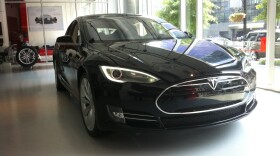 The Model S electric sedan sits in a Tesla showroom in Washington, D.C.