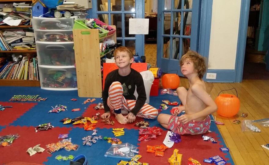 The morning after Halloween, the first thing the kids did was start eating Halloween candy — and then they began to sort it in preparation for the candy buyback.