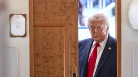 President Donald Trump arrives to speak to reporters aboard Air Force One en route from Joint Base Andrews, Md., to Eau Claire, Wis., Friday, June 5, 2026.