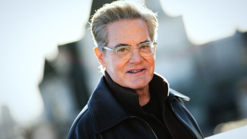 "Ultimately, I was the audience's guide into a very scary place," Kyle MacLachlan says of his roles in Blue Velvet and Twin Peaks. He's shown above in London on Dec. 3, 2025.