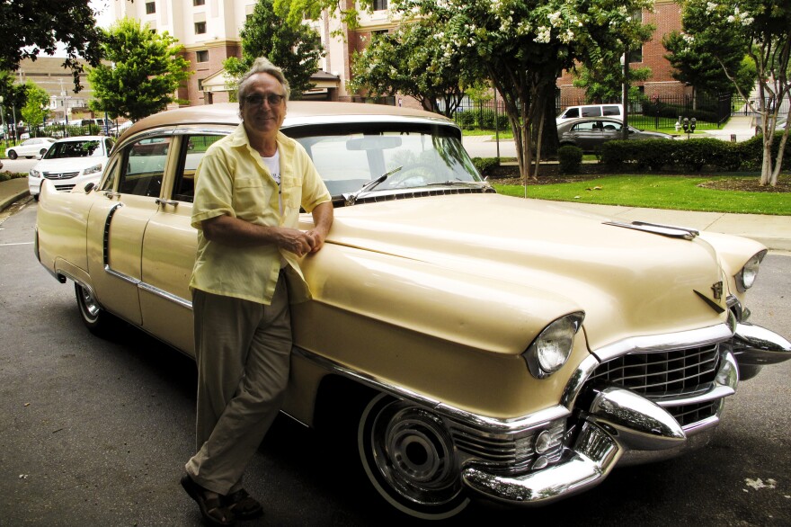 American Safari tour guide Tad Pierson stands beside his 1955 Cadillac. Visitors to Memphis can get a personalized tour that highlights the city's rich music heritage.