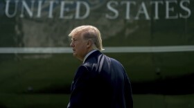 President Donald Trump walks across the South Lawn of the White House in Washington, Tuesday, Aug. 22, 2017. 