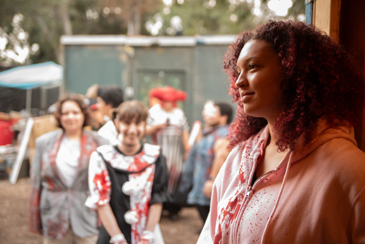 Scare actor Deja Jackson waiting to be made up for The Haunted Trail in Balboa Park. Sept. 25, 2025.