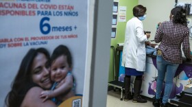 Dr. Acklema Mohammad checks a patient at El Nuevo San Juan Health Center in the Bronx in New York City in 2024. Community health clinics, like this one, are often located in immigrant communities and rely on Medicaid.