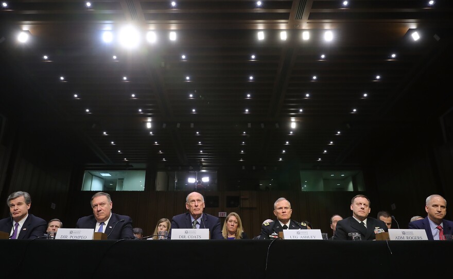 Left to right: FBI Director Christopher Wray, CIA Director Mike Pompeo, Director of National Intelligence Dan Coats, Defense Intelligence Agency Director Lt. Gen. Robert Ashley, NSA Director Adm. Michael Rogers and National Geospatial Intelligence Agency Director Robert Cardillo testify before the Senate intelligence committee on Capitol Hill Tuesday.