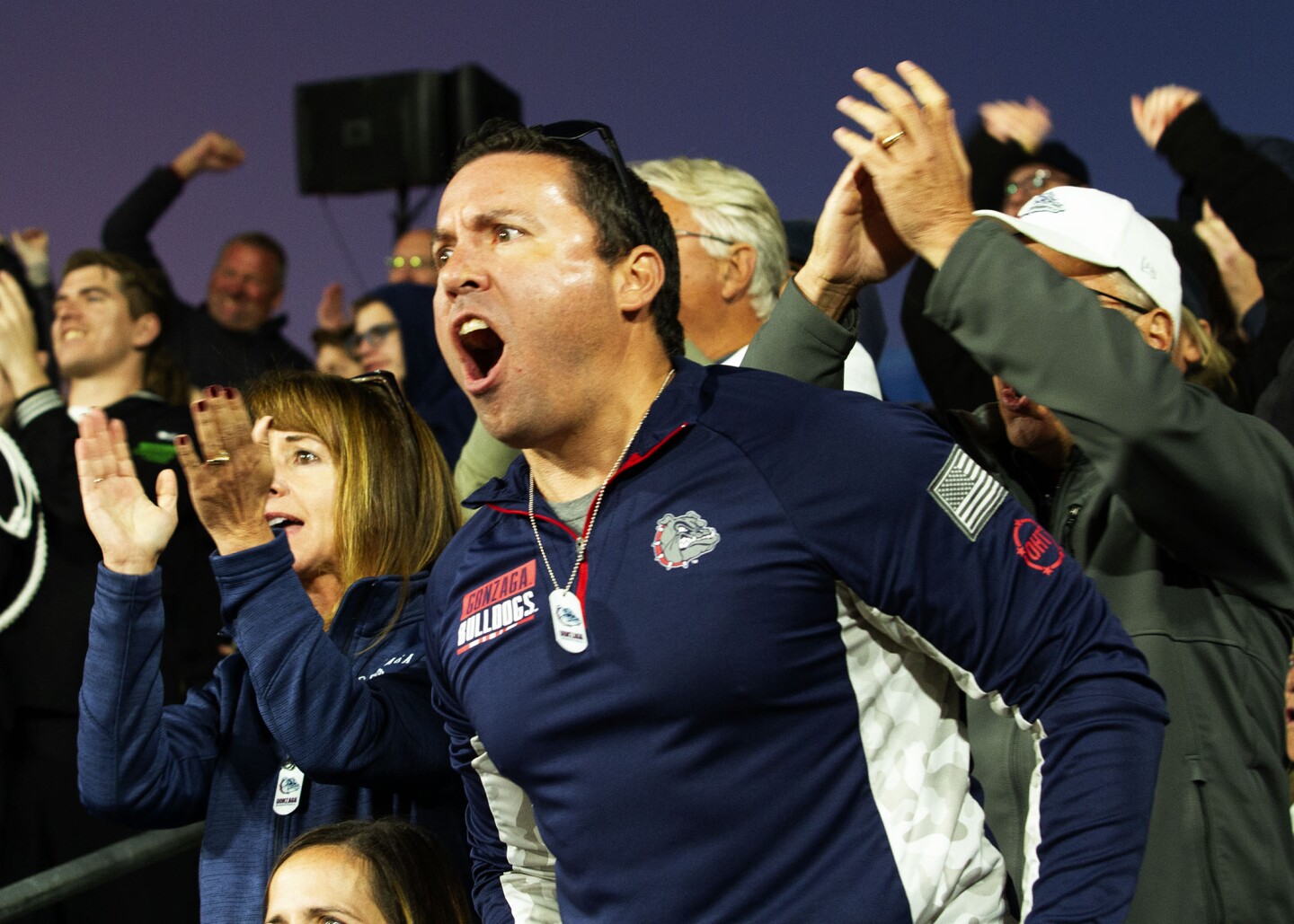 A Gonzaga fan cheers as Gonzaga takes on MSU aboard the USS Abraham Lincoln in San Diego during the Armed Forces Classic on Nov. 11, 2022.