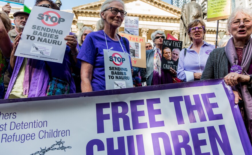 Australian protesters demonstrate in Melbourne on Feb. 4 after the Australian High Court upheld a challenge to the government's right to hold asylum seekers at detention camps in Papua New Guinea and Nauru.
