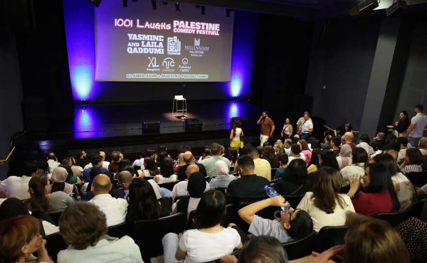 A Palestinian audience gathers in Bethlehem to see comedians from the U.S. and other countries perform live on Zoom after Israel refused to let the comics enter the country to participate in the Palestine Comedy Festival in the West Bank in August.