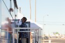 A person gets tested for COVID-19 at a mobile testing facility parked outside of the El Centro Public Library, Dec. 18, 2020.