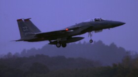 An F-15 Eagle from the 67th Fighter Squadron at Kadena Air Base, Japan, takes off for a mission, November 2012.