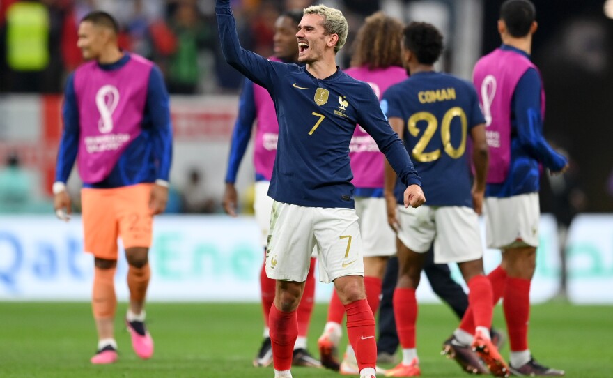 Antoine Griezmann celebrates after France's 2-1 win over England in the quarterfinals on December 10, 2022 in Al Khor, Qatar.