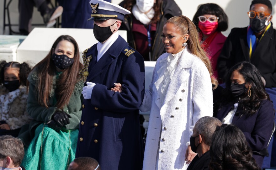 Jennifer Lopez is escorted to the inauguration.