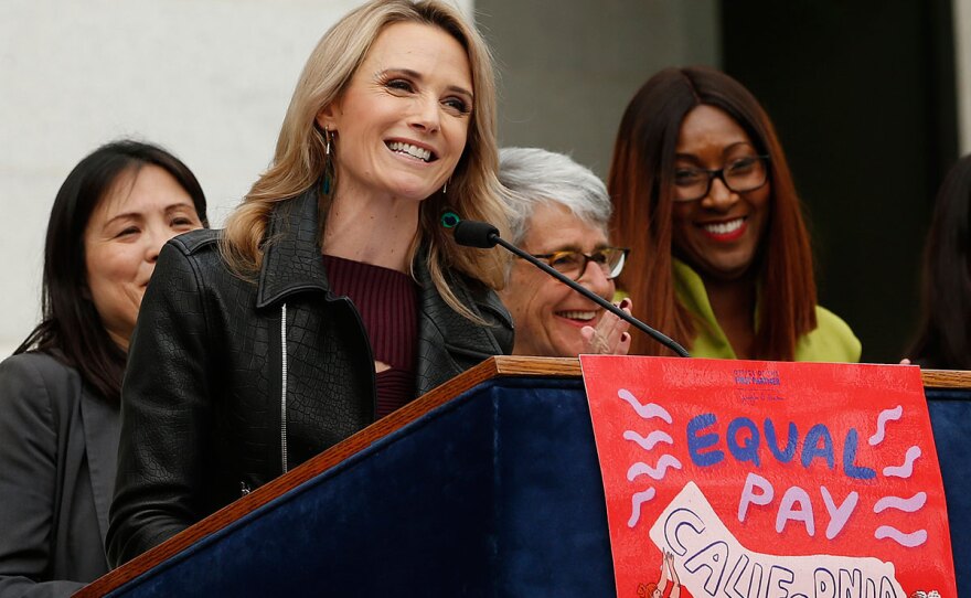 California First Partner Jennifer Siebel Newsom, center, the wife of Gov. Gavin Newsom, calls for equal pay for women during a news conference, Monday, April 1, 2019.