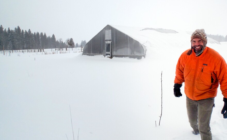 Karl Sutton leaves his mobile greenhouse in Montana. He sells spinach as part of a farmers co-op, and likes that non-profit business model for his health insurance, too.